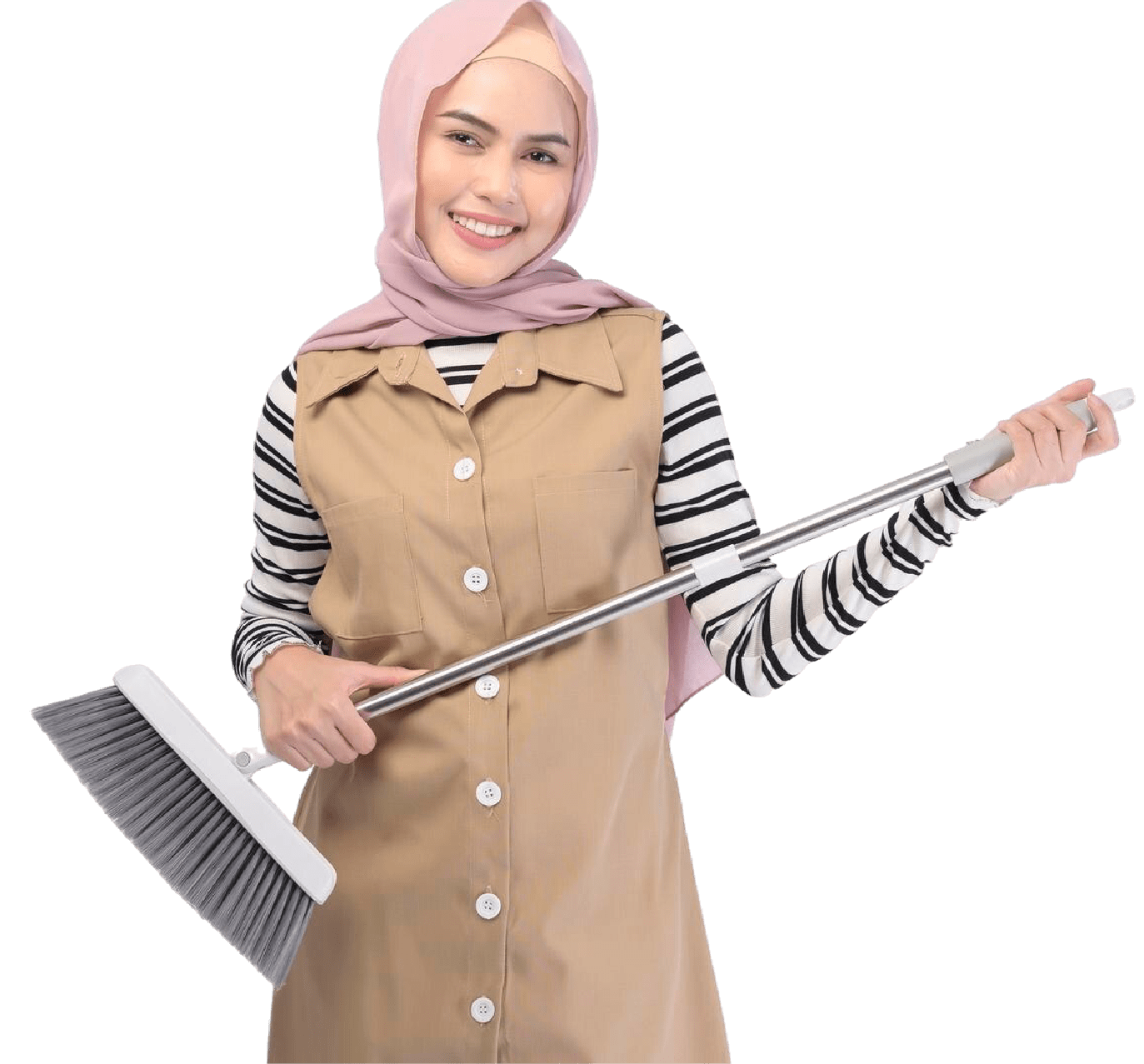 Smiling woman in hijab with broom, wearing brown apron over striped shirt, ready to clean